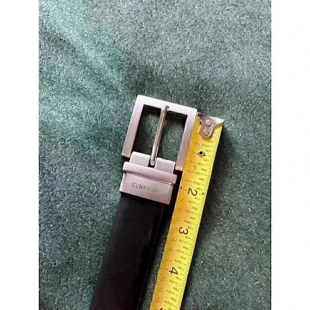 Calvin Klein black leather belt 42” x 1” wide brushed silver tone hardware